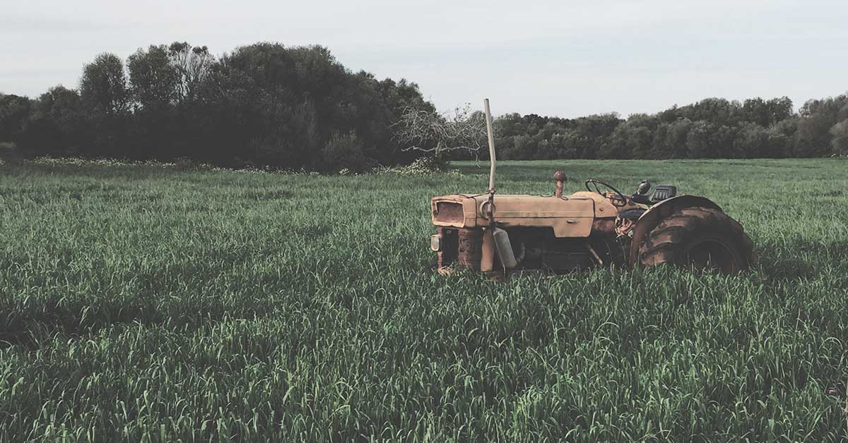 broken down tractor in a field