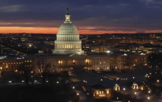 Overhead view of the US Capitol at night