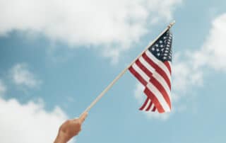hand waving us flag
