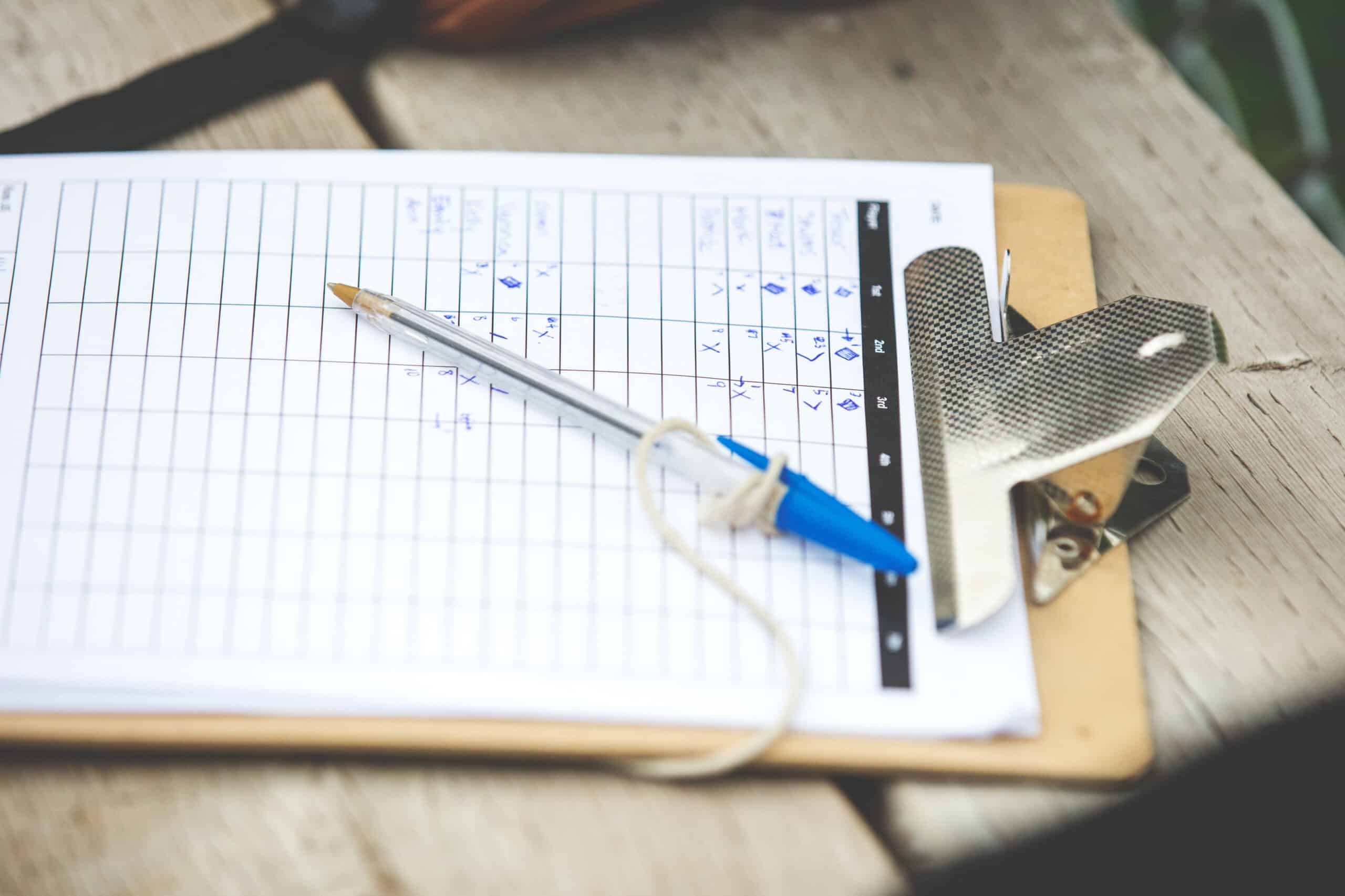 Baseball score sheet on clipboard