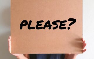 person-holding-please-sign