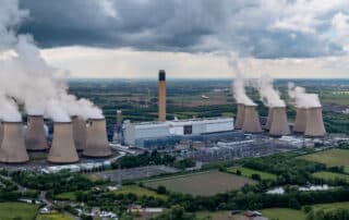An aerial landscape view of Drax Power Station in North Yorkshire emitting carbon dioxide pollution into the atmosphere