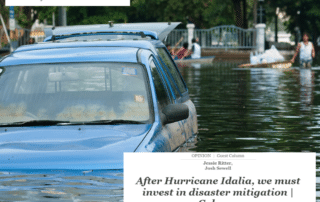 Flooded neighborhood with article title overlaid