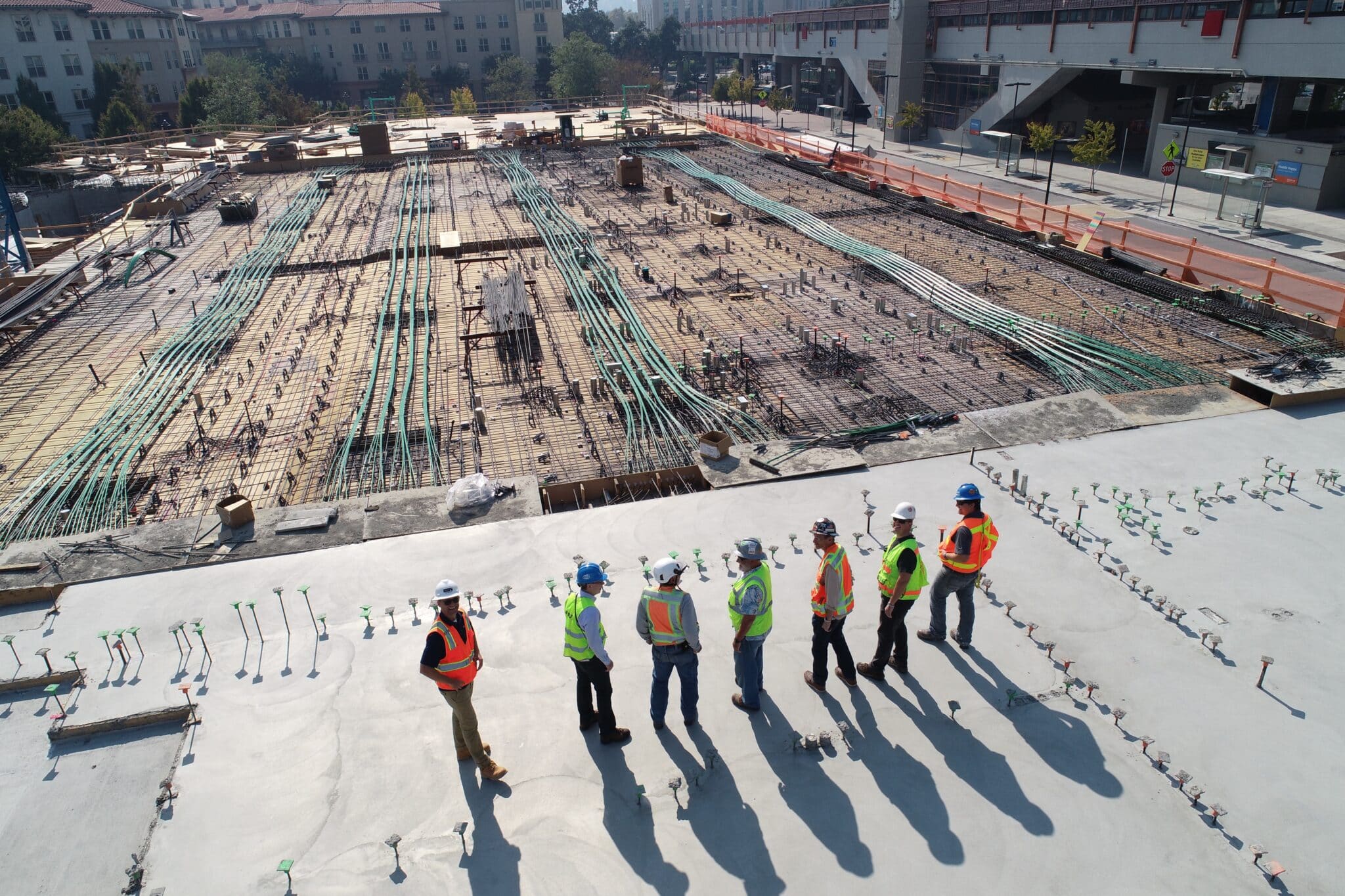 construction leaders looking over worksite