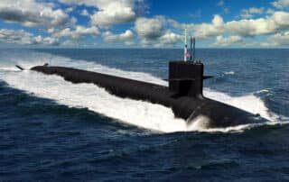 Partially submerged submarine in open water