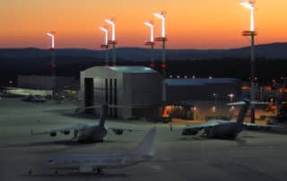 AIr base in Germany in the sunset with three aircraft in the foreground