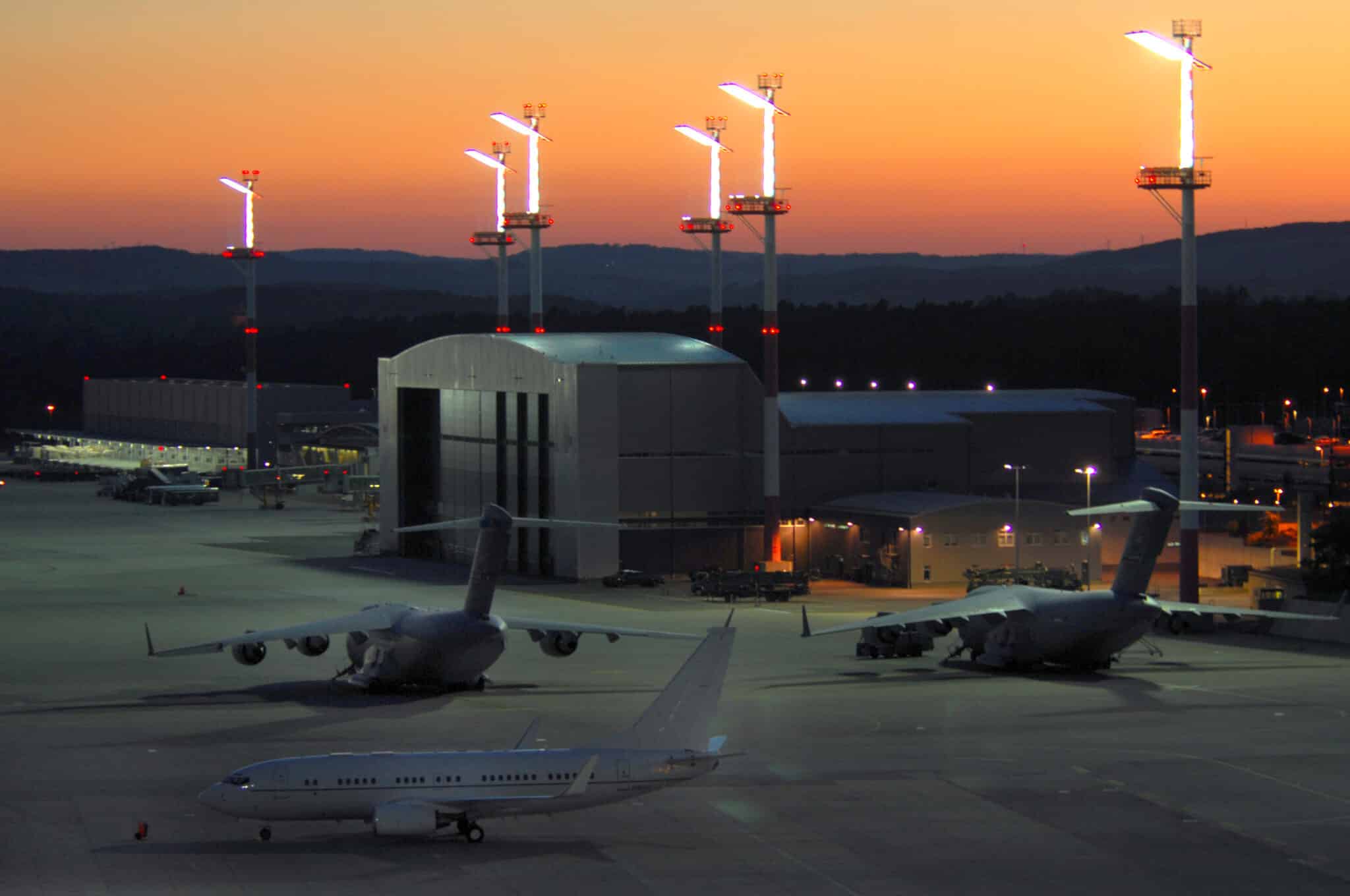 AIr base in Germany in the sunset with three aircraft in the foreground