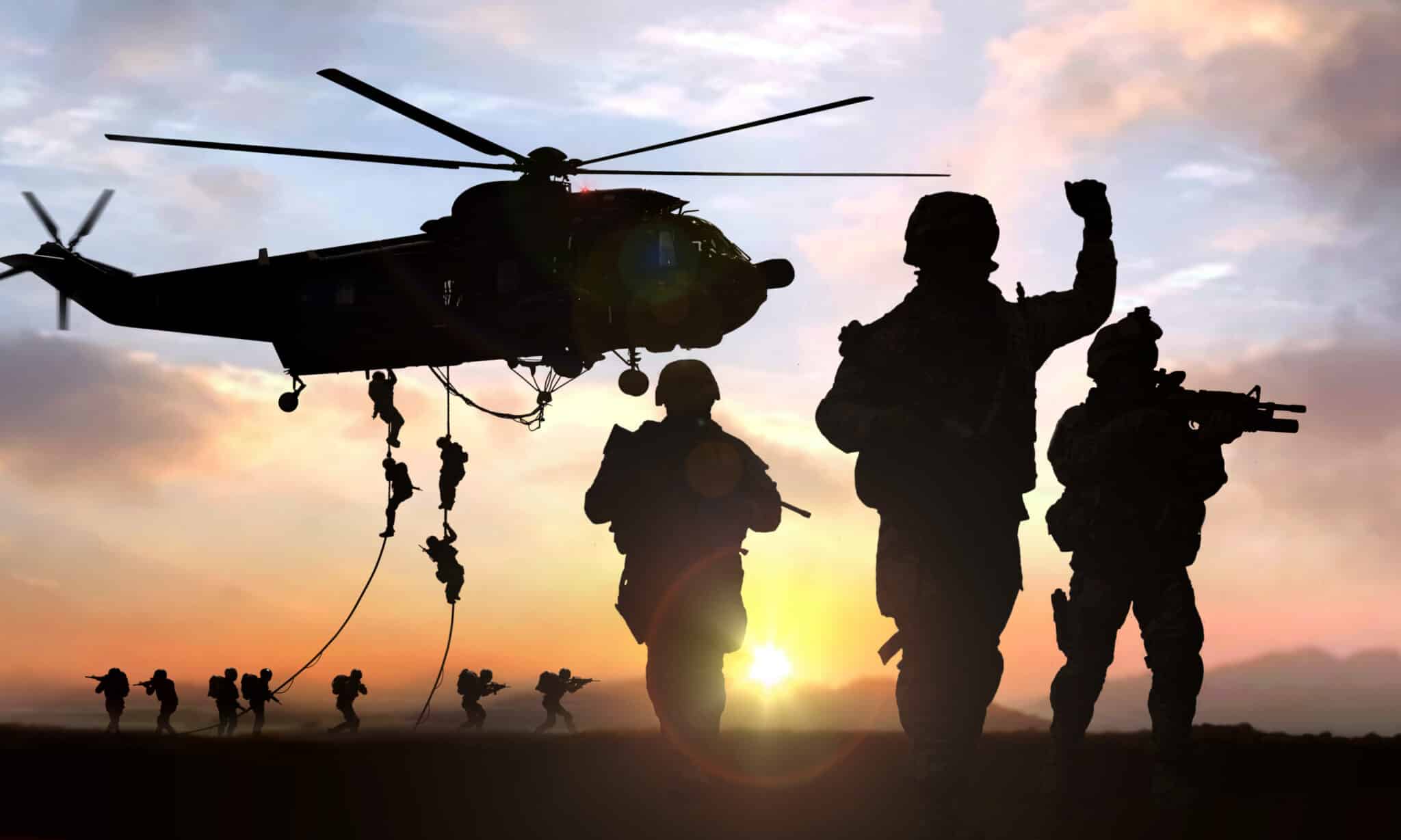 silhouette of military operation at sunset scaled