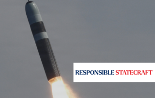 A trident missile soars through the sky