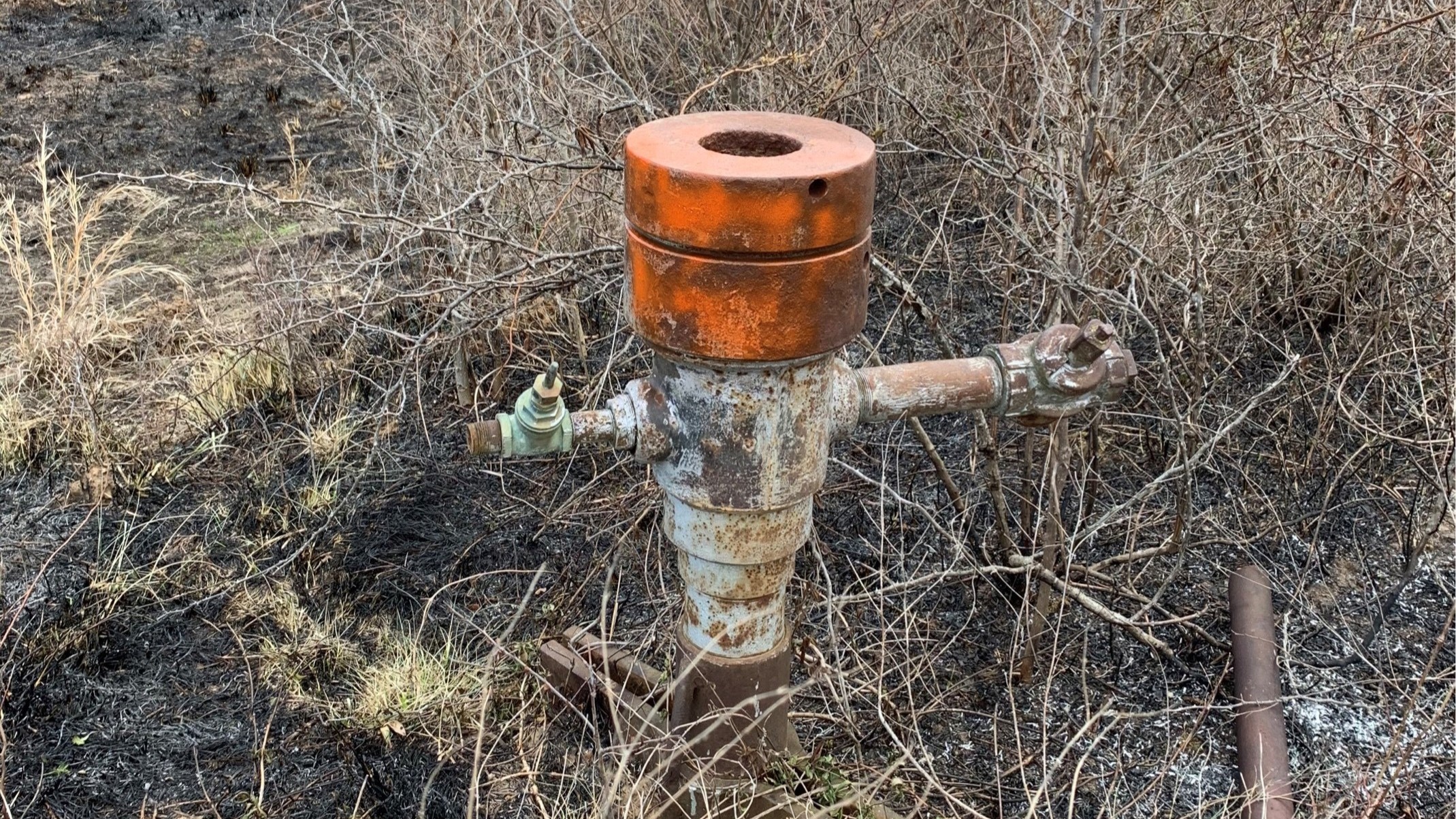 an orphaned oil well at deep fork refuge